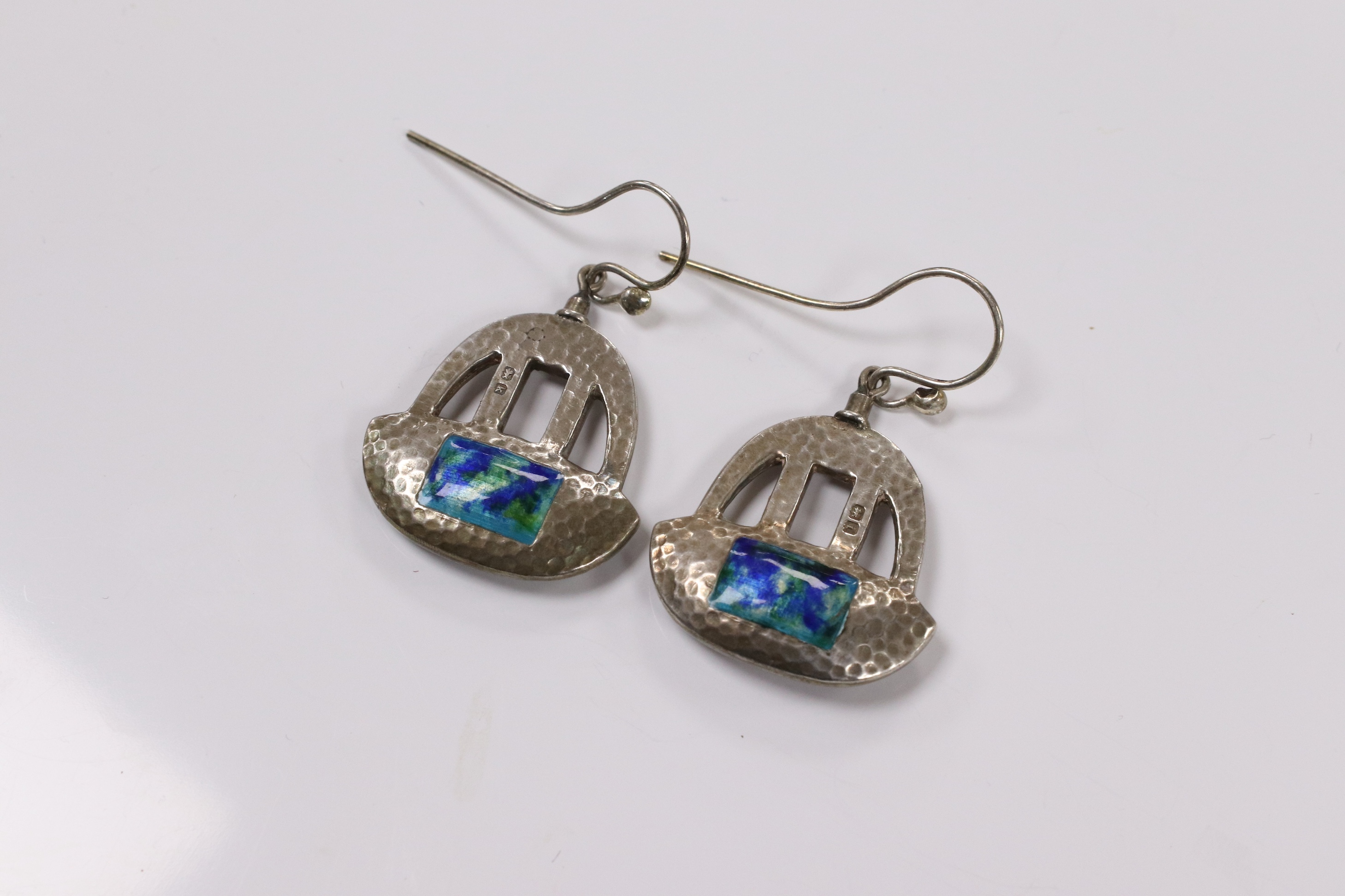 A pair of Edwardian Art Nouveau silver and enamel drop earrings, by Gourdel Vales & Co, Birmingham, 1909, 24mm. Condition - poor(small chip to enamel).